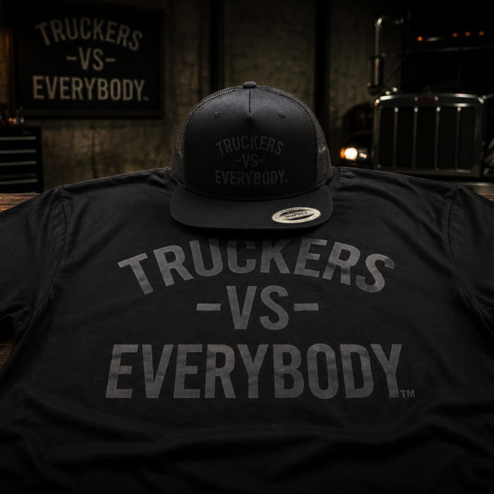 Truckers-Vs-Everybody™ Statement Tee (Black on Black)